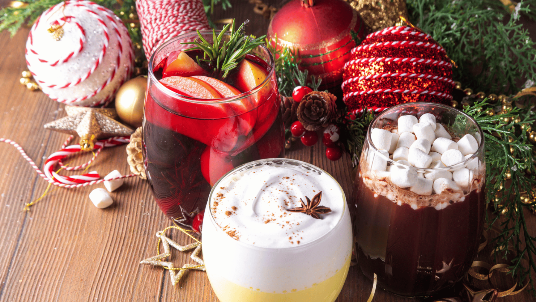Christmas mulled wine, eggnog, hot chocolate and baubles