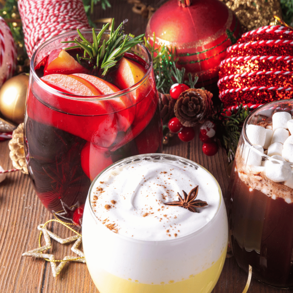 Christmas mulled wine, eggnog, hot chocolate and baubles