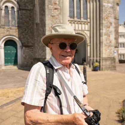 Man with camera lifestyle square