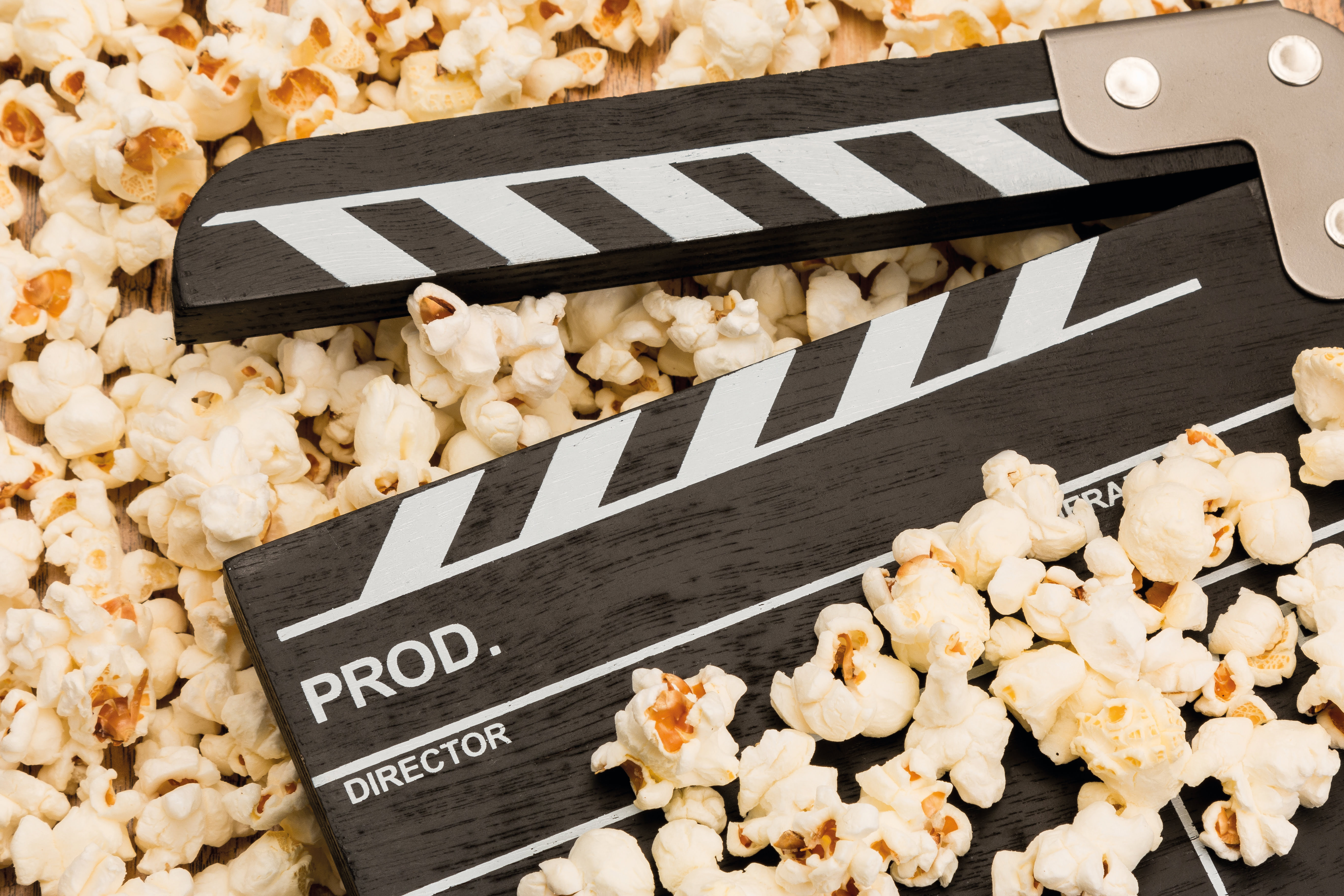 Clapperboard and popcorn